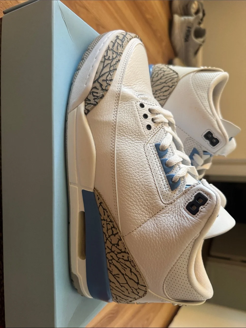 Jordan White and Light Blue Retro Sneakers